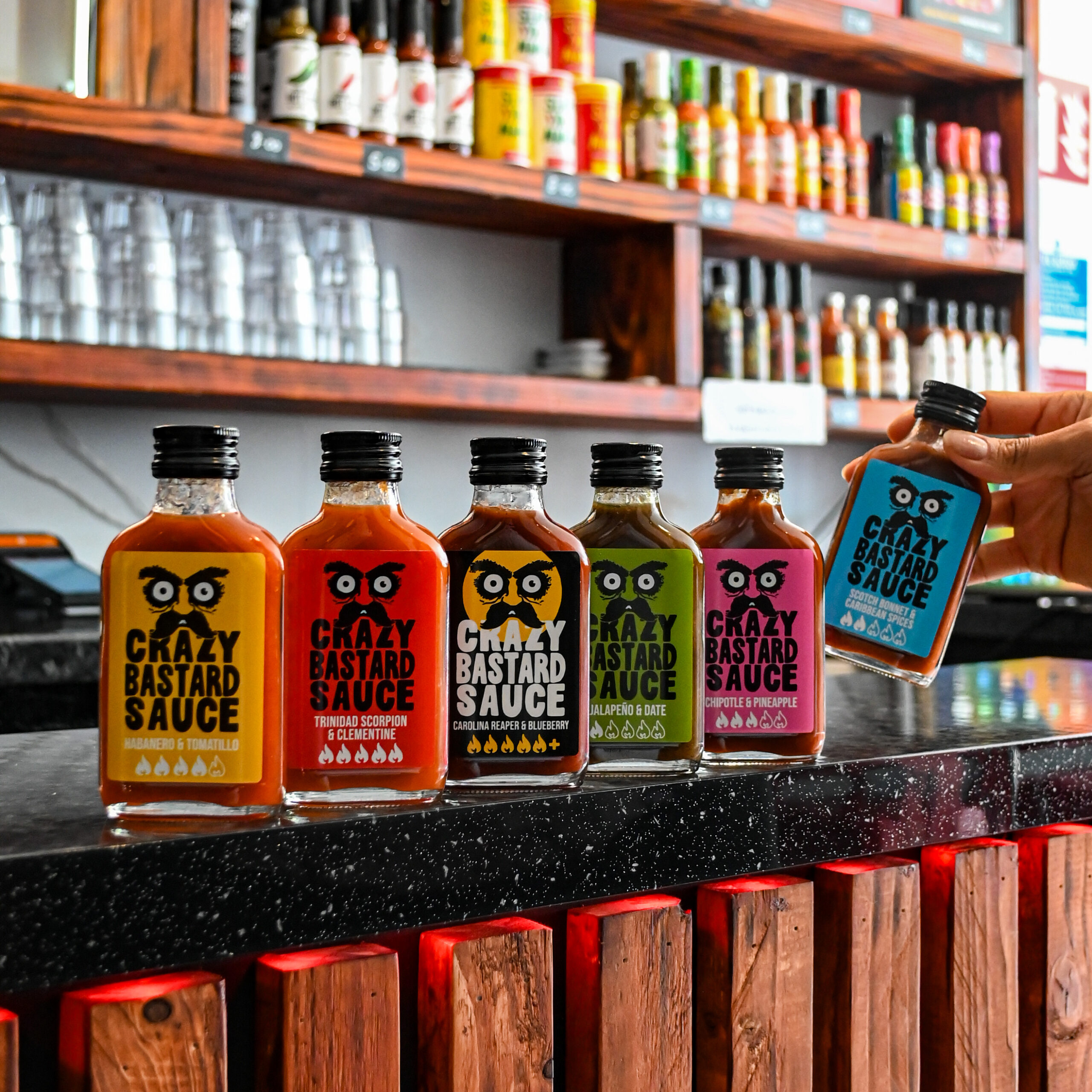 photo of crazy bastard hot sauce placed on a counter